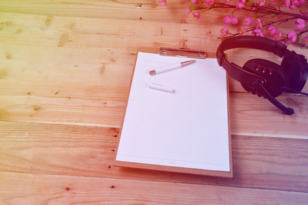 Blank diary on wood backgroundの写真素材