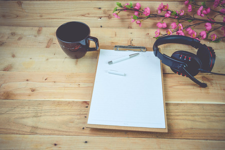 Blank diary on wood backgroundの写真素材