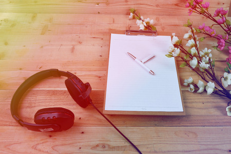 Blank diary on wood backgroundの写真素材