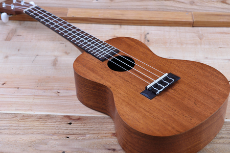 Ukulele on a wooden background.Vintage Conceptの写真素材