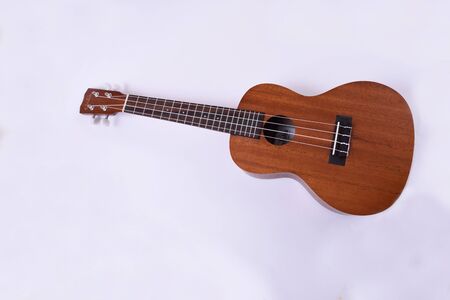 ukulele guitar isolated on white backgroundの写真素材