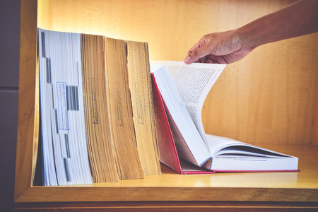 Old books on a wooden background.,Vintage Conceptの写真素材