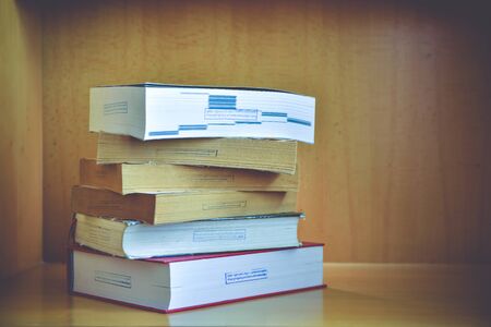 Old books on a wooden .Vintage Conceptの写真素材