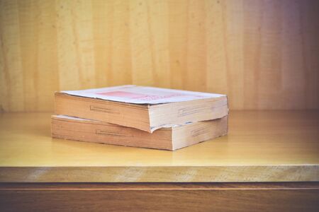 Old books on a wooden .Vintage Conceptの写真素材