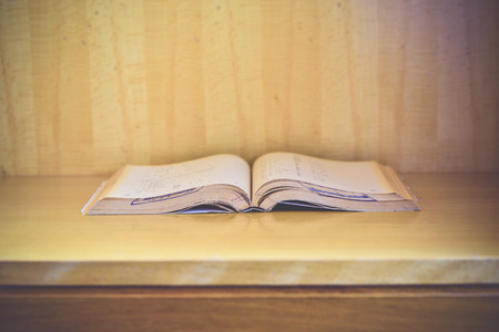 Old books on a wooden background.,Vintage Conceptの写真素材