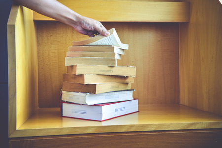 Old books on a wooden background.,Vintage Conceptの写真素材
