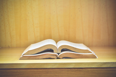 Old books on a wooden background.,Vintage Conceptの写真素材