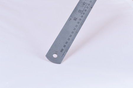Metric steel ruler, isolated on white.の写真素材