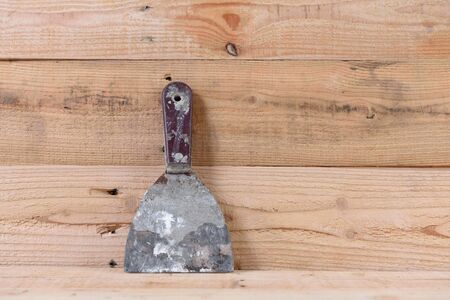 Plastering equipment Placed on a wooden background.の写真素材