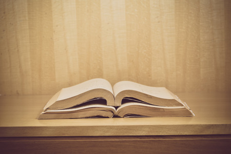 Old books on a wooden background.,Vintage Conceptの写真素材
