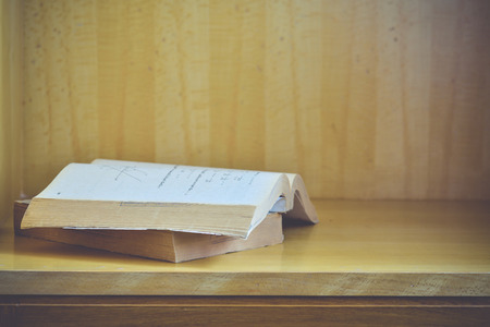 Old books on a wooden background.,Vintage Conceptの写真素材