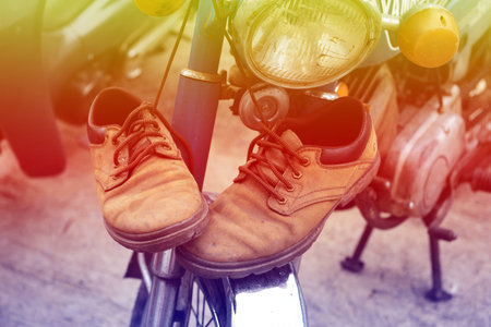 Men's leather shoes and old Motorcycles.,Vintage conceptの写真素材