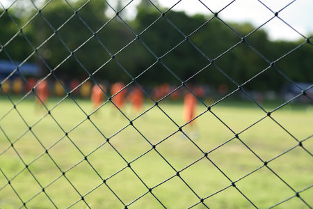 boys kicking football on the sports field,abtract blur