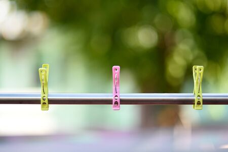 Rail clothespin as wallpaper.の写真素材