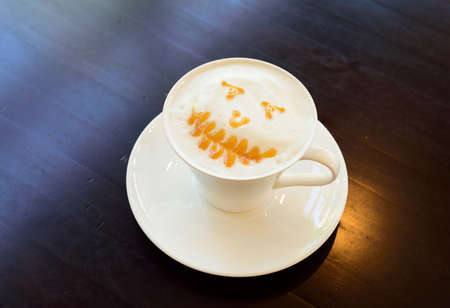 Hot milk and a glass of white, concept, smiling.の写真素材
