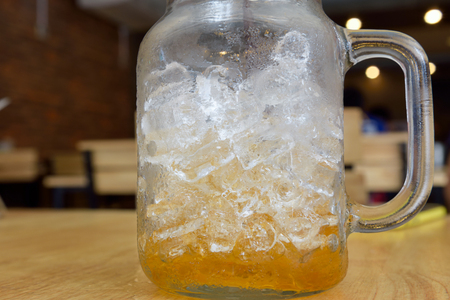 Cold lemon tea in glass bottlesの写真素材