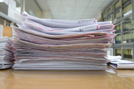 a file folder with documents and important documentsの写真素材