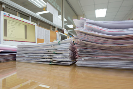 a file folder with documents and important documentsの写真素材