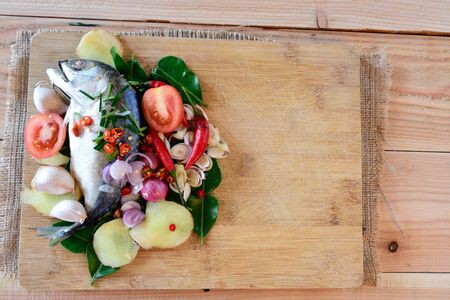 mackerel,Soup and spices on wood background.の写真素材