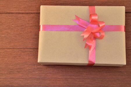 Gift Box,on wood backgroundの写真素材