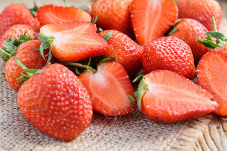 Fresh strawberries on wood background.の写真素材