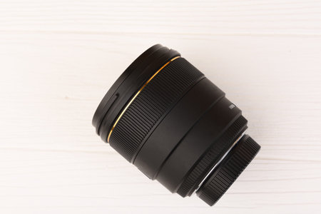 camera lens on White deskの写真素材