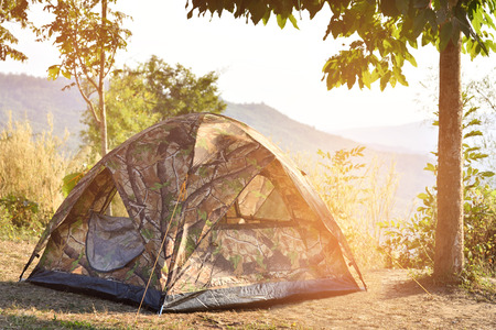 Tourists tent to rest on a mountain.の写真素材