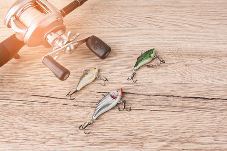 Fishing bait pace on wood desk backgroundの写真素材