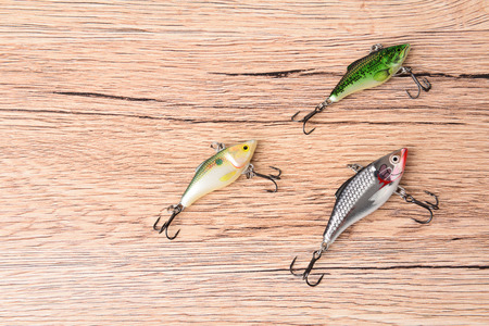 Fishing bait pace on wood desk backgroundの写真素材