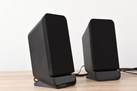 speaker computer pace on wood desk background.の写真素材