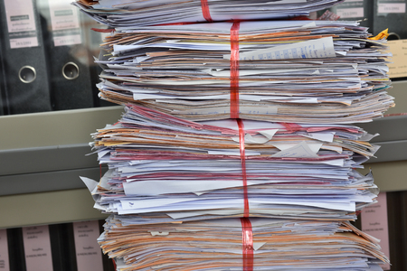 Stack of paper documents in the office use for reuse recycleの写真素材