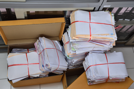 Stack of paper documents in the office use for reuse recycleの写真素材