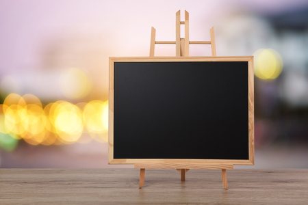 Blackboard on wooden floor,Blank space for text input.の写真素材