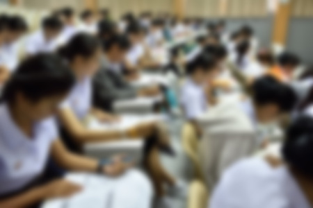Students in the classroom are talking,Abstract blurryの写真素材
