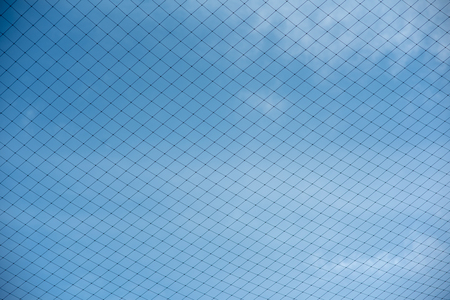 The net in the back football field is sky.の写真素材