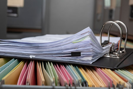 Stacked documents on the office desk,Colorful paper post it the background