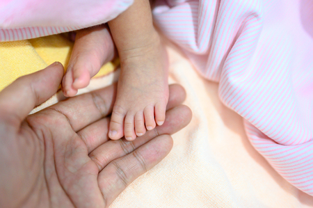 Newborn baby's feetの写真素材