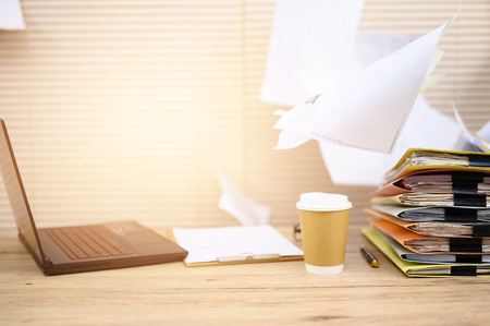 Business documents placed on the office deskの写真素材