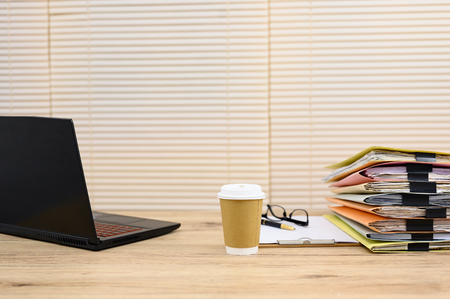 Business documents placed on the office deskの写真素材