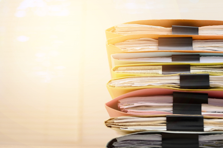 Business documents placed on the office deskの写真素材