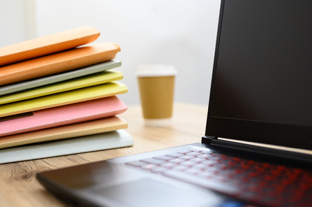 Business documents placed on the office deskの写真素材