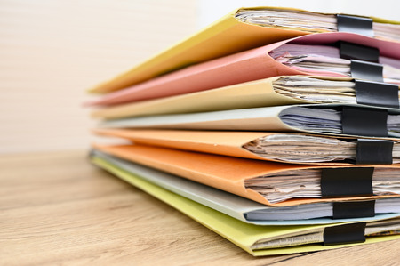 Business documents placed on the office deskの写真素材