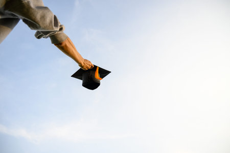 Throw a black hat of graduates in the sky.