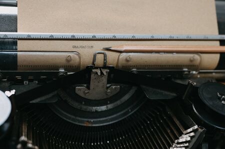 Old black typewriter Type "Graduation"の写真素材