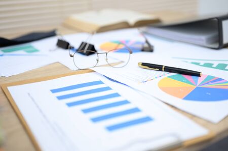 Business documents placed on the table at the officeの写真素材