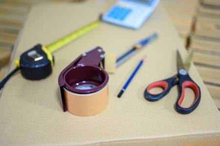 Equipment for packing boxes for shipping to customersの写真素材