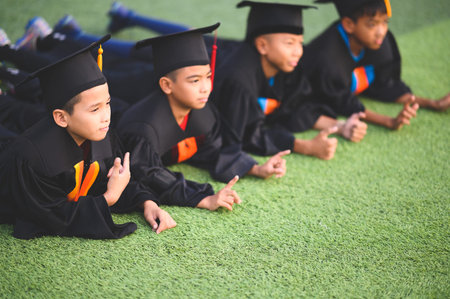 A group of boys are happy on their graduation day at school.