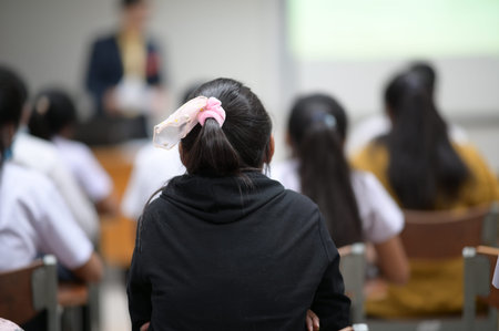 Teachers and students are studying in a classroom at the university.の写真素材