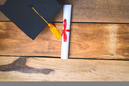 Portrait Young Asian woman university graduates celebrate degree certificate in commencement ceremony. Congratulations, graduation, education.の写真素材