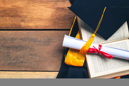 Portrait Young Asian woman university graduates celebrate degree certificate in commencement ceremony. Congratulations, graduation, education.の写真素材